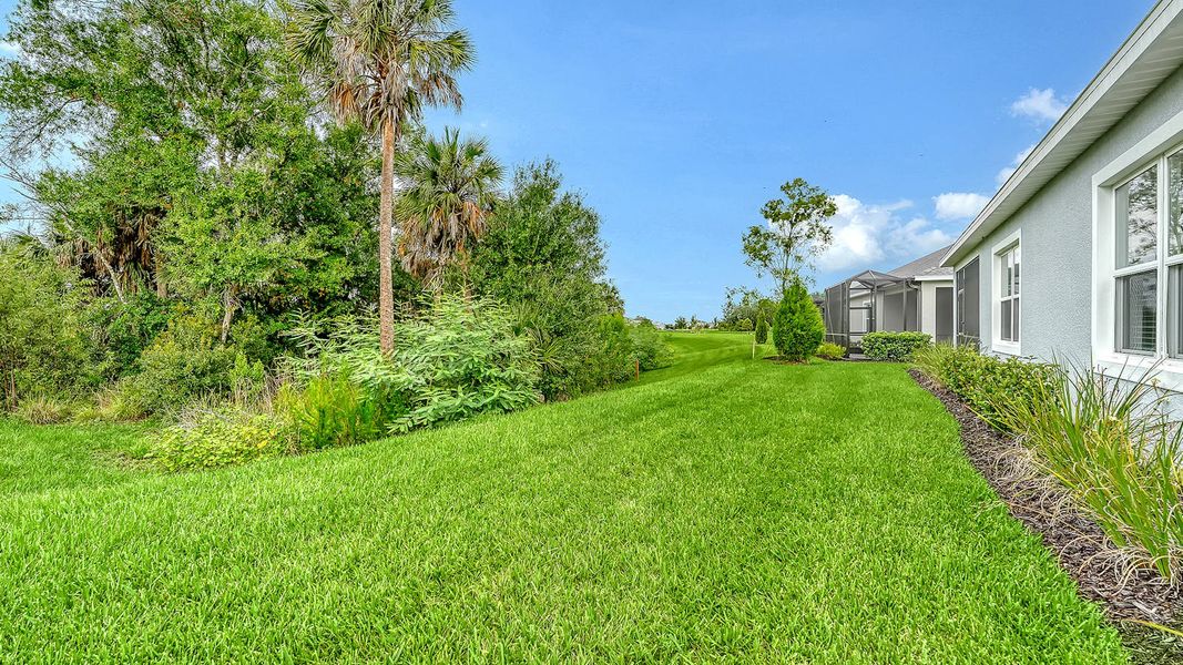 Exterior details and patio area of a home in Wildleaf Real Estate and Homes for Sale in Parrish, FL - Neal Communities, Parrish (Image 21).