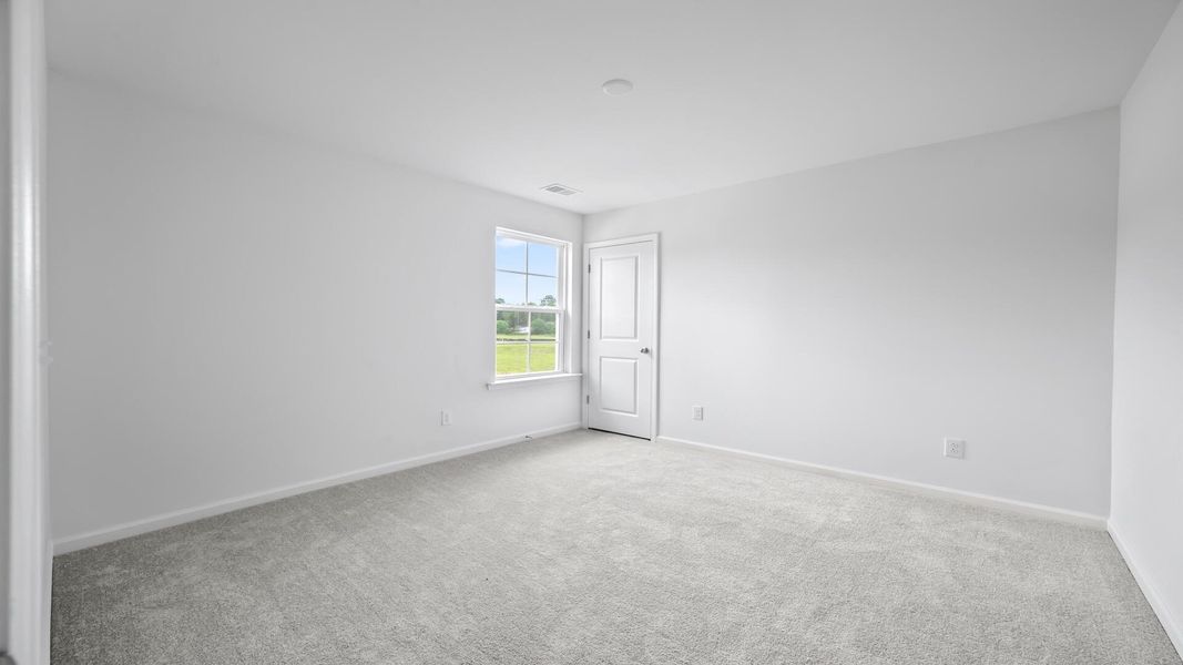 Spacious, unfurnished interior of a new home in Creekside at Andrews, Summerville (Image 14).