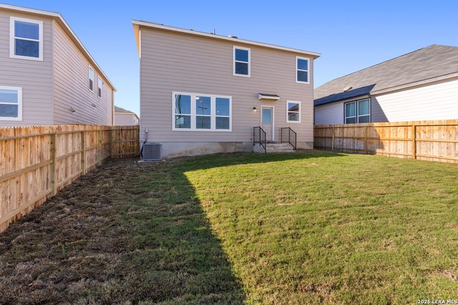 Exterior details and patio area of a home in Knox Ridge, Converse (Image 20).