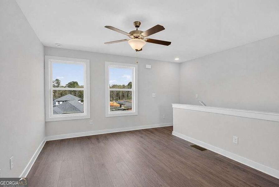 Spacious, unfurnished interior of a new home in The Cottages at East Lanier, Fayetteville (Image 12).