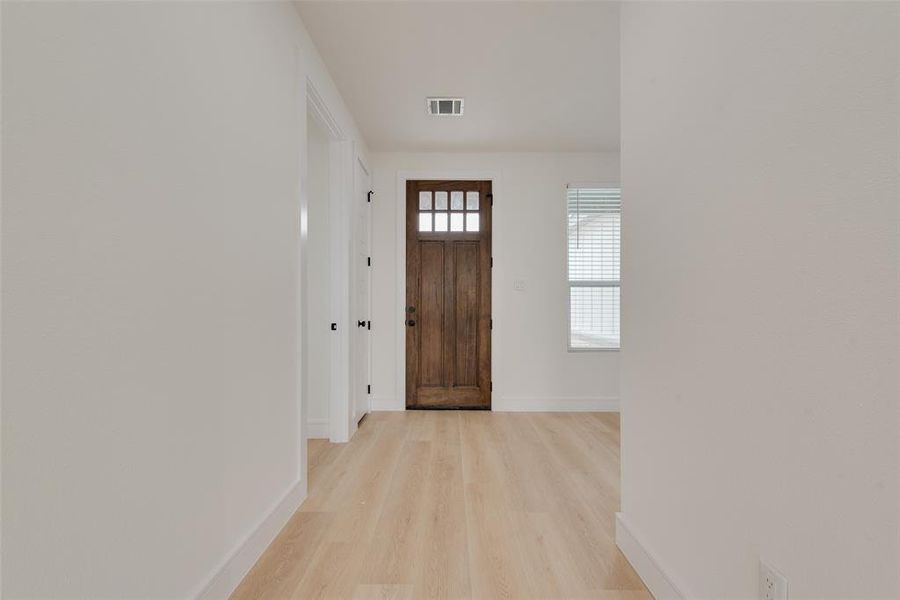 Foyer entrance featuring light wood-type flooring