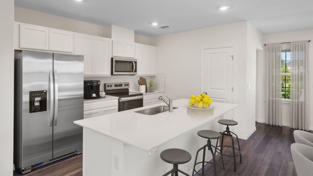 Representative furnished interior of a home built from the Sandhill by D.R. Horton in Waterleigh, Winter Garden (Image 3).