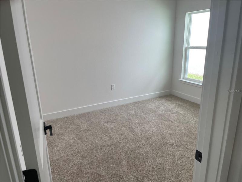 Spacious, unfurnished interior of a new home in Harmony Central, St. Cloud (Image 11).