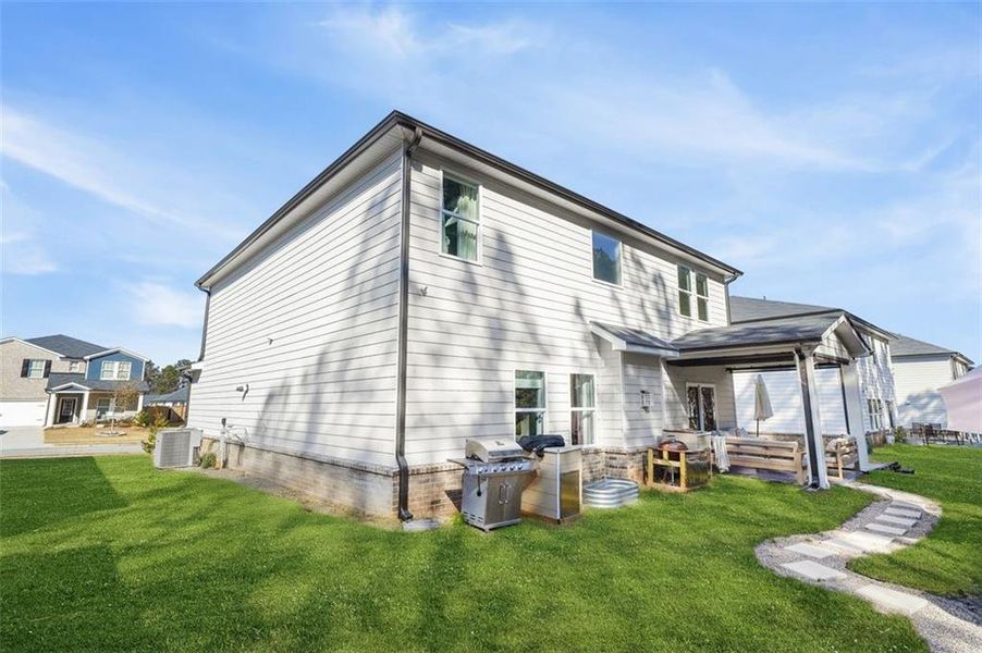 Exterior details and patio area of a home in , Loganville (Image 28).