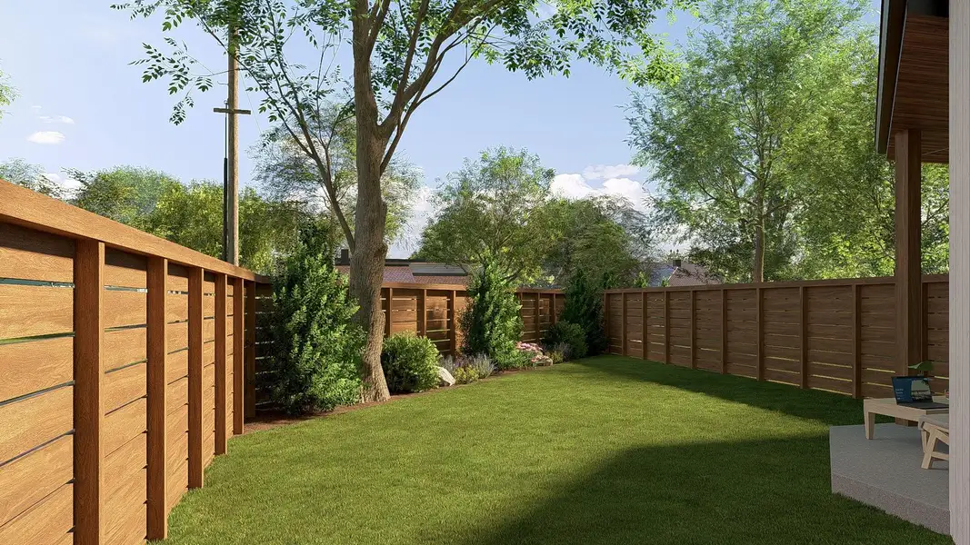 View of fenced backyard