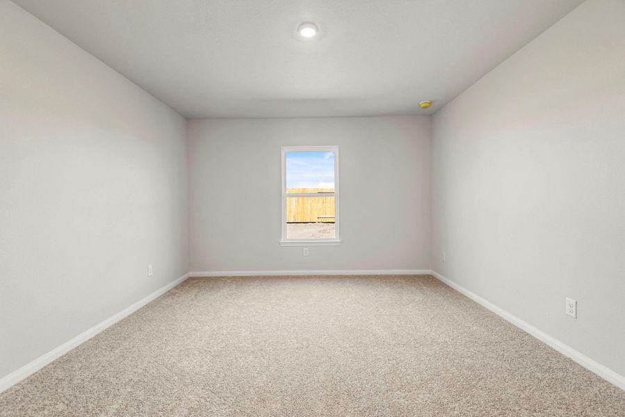 The primary bedroom is a great place to relax after a long day, and it’s large enough for the king-sized bed! The primary bedroom is a great place to relax after a long day, and it’s large enough for the king-sized bed!