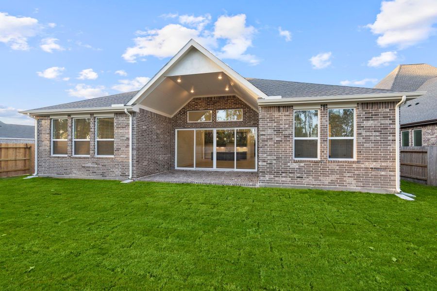 Exterior details and patio area of a home in Evergreen, Conroe (Image 20).