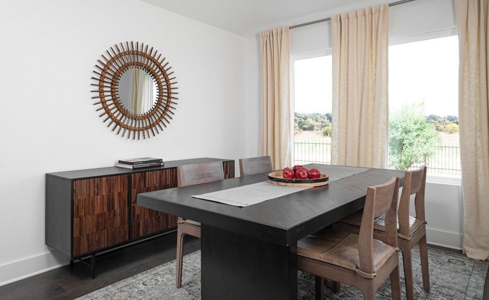 Representative furnished interior of a home built from the Manchester II by Ashton Woods in Willow Springs, Buda (Image 7).