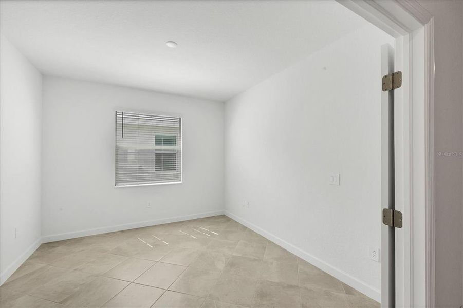 Spacious, unfurnished interior of a new home in , Port Charlotte (Image 25).