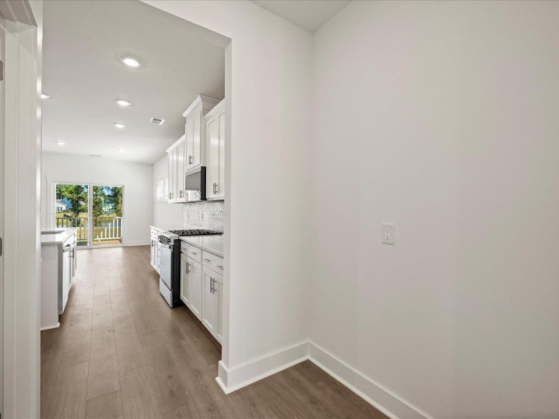 Furnished interior view inside a new home in The Coves at Lakes of Cane Bay, Summerville (Image 6). Furnished interior view inside a new home in The Coves at Lakes of Cane Bay, Summerville (Image 6).