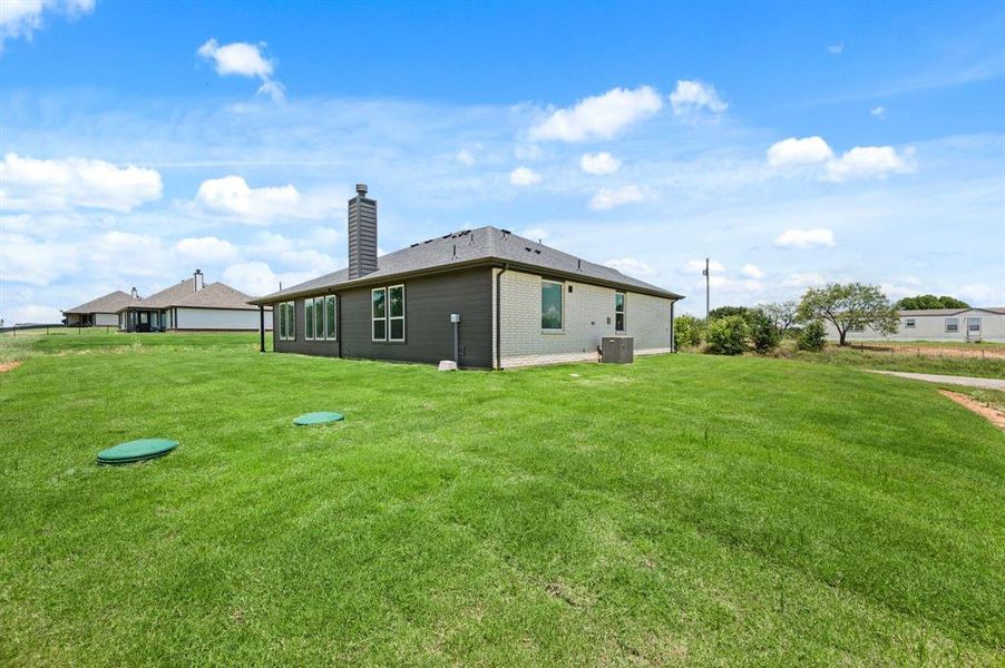 Front exterior of a new home in Saddleback Estates, Boyd, TX, highlighting curb appeal (Image 21).