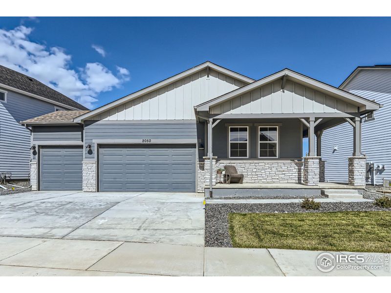 These photos are renderings of another model with the same floorplan and give you a sense of what the home and elevation look like. Pictures of the actual house will be uploaded once it is completed.