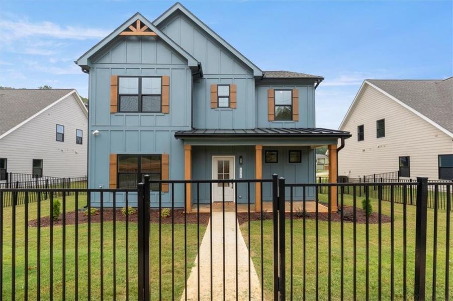 Front exterior of a new home in , Emerson, GA, highlighting curb appeal (Image 22).