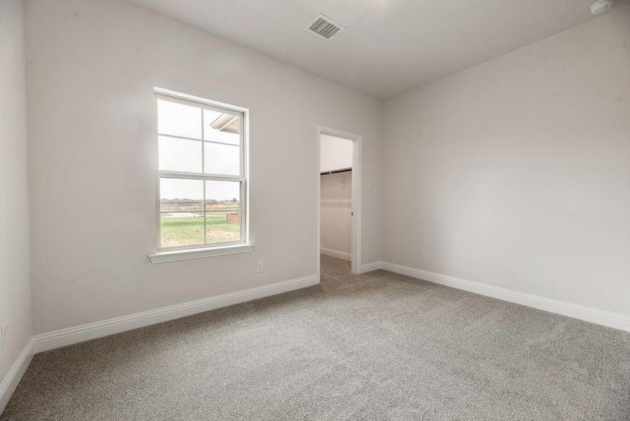 Spacious, unfurnished interior of a new home in Spiritas Ranch, Little Elm (Image 28).