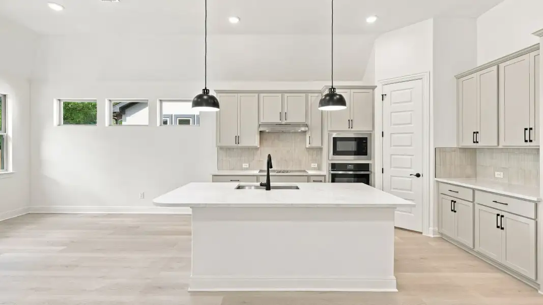 Furnished interior view inside a new home in Oaks at San Gabriel, Georgetown (Image 27).