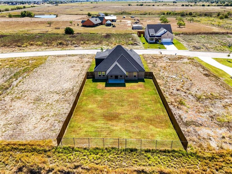 Front exterior of a new home in , Venus, TX, highlighting curb appeal (Image 20).