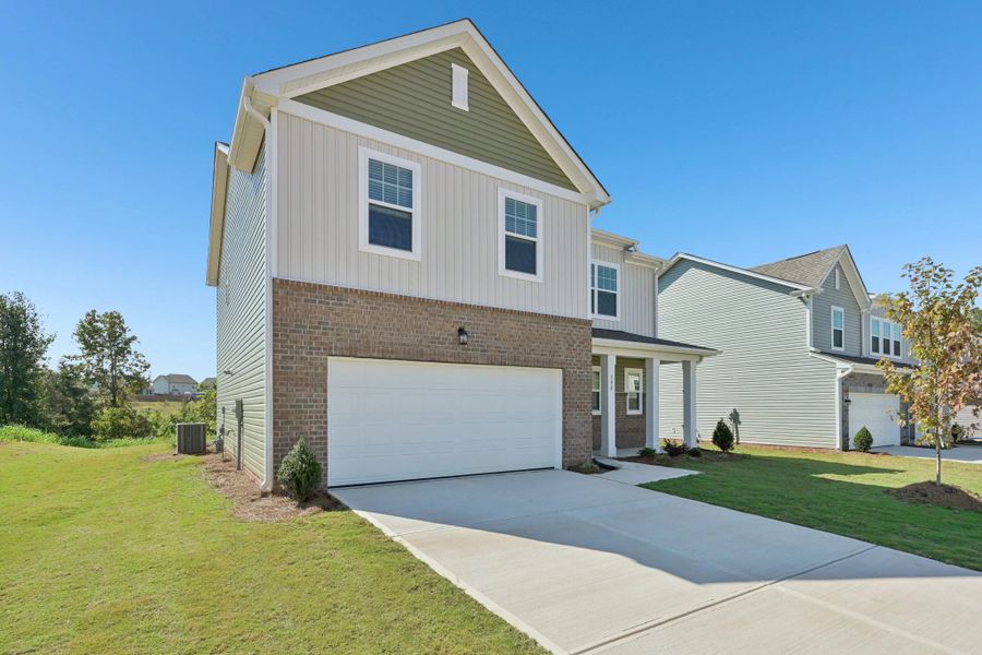 Representative exterior photo of a completed home built from the Splendor by Starlight Homes in The Meadows, Mebane, NC (Image 22).