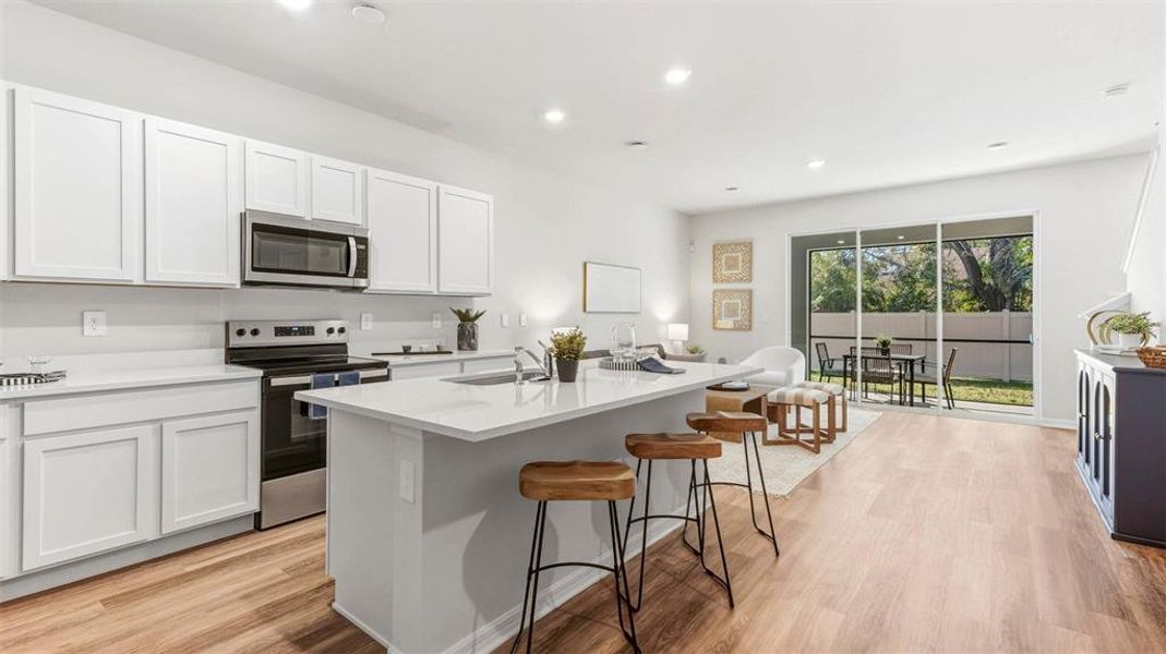 Furnished interior view inside a new home in Oasis at Longwood Run, Sarasota (Image 11).