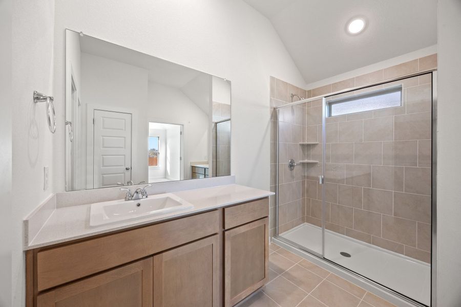 Primary Bathroom in the Turquoise home plan by Trophy Signature Homes – REPRESENTATIVE PHOTO