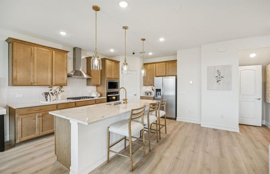 *Model Representation - Spacious kitchen with eat-in bartop island