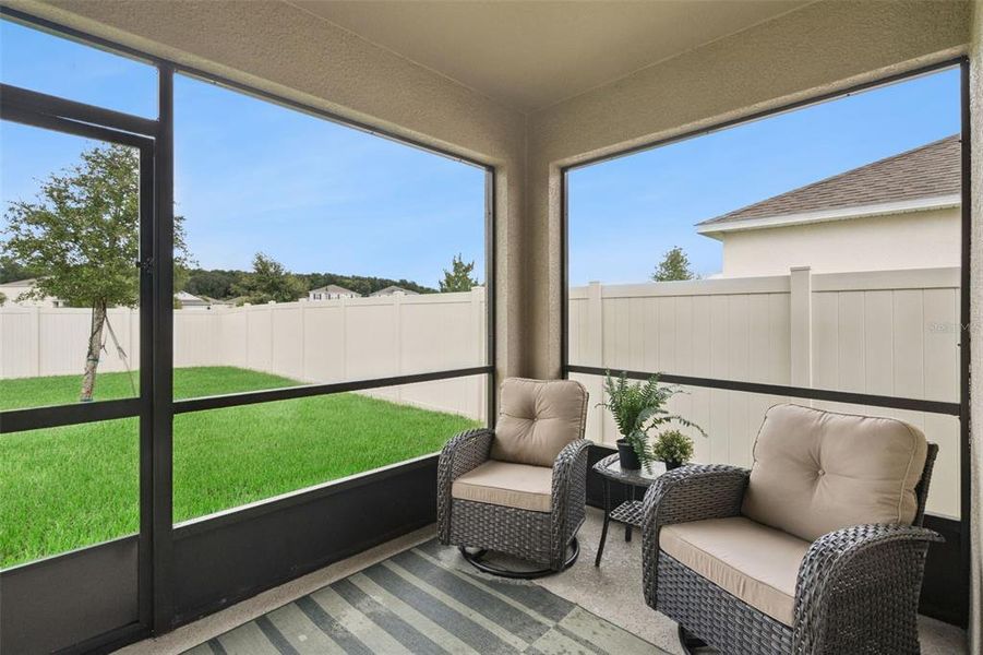 Exterior details and patio area of a home in Windrose, Apopka (Image 4).