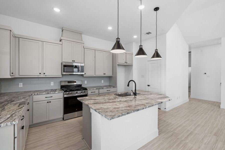 Furnished interior view inside a new home in Bridgeland, Cypress (Image 8).