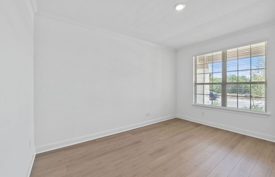 Spacious, unfurnished interior of a new home in Bluffview Reserve, Leander (Image 62).