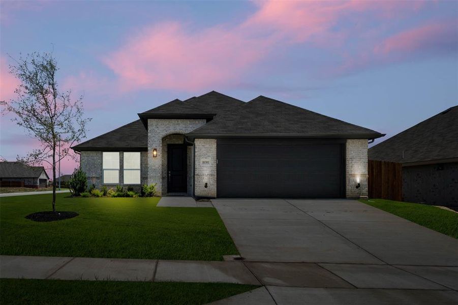 Front exterior of a new home in Summer Crest, Fort Worth, TX, highlighting curb appeal (Image 22).