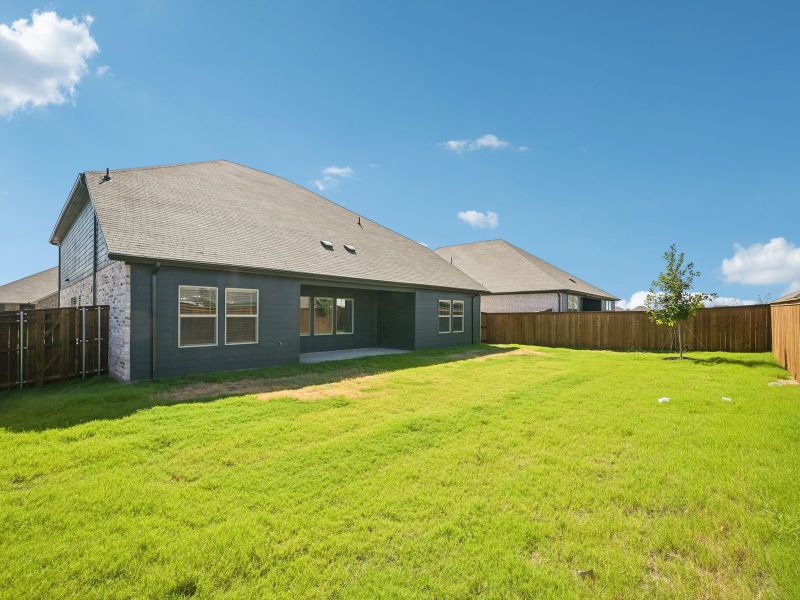 Exterior details and patio area of a home in Lakehaven - Premier Series, Farmersville (Image 3).