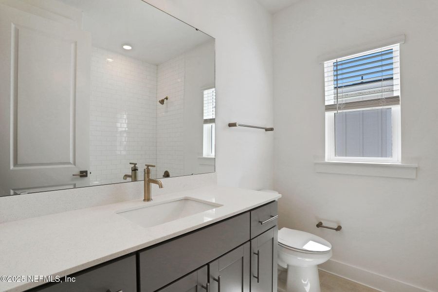 Furnished interior view inside a new home in North Beach Townhomes, Jacksonville Beach (Image 10).