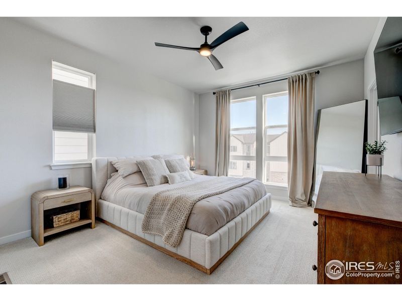 Primary Bedroom with large windows for natural light.