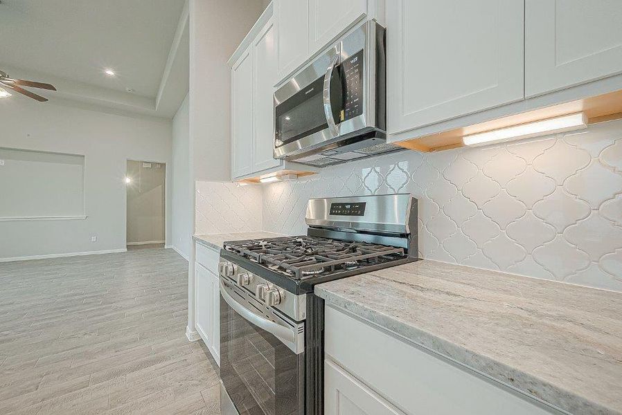 Furnished interior view inside a new home in Grand Magnolia, Magnolia (Image 26).
