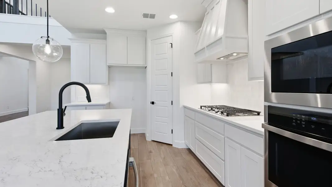 Furnished interior view inside a new home in Eliana, McKinney (Image 13).