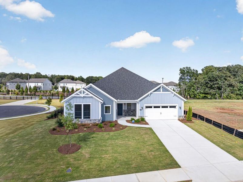 Front exterior of a new home in , Dacula, GA, highlighting curb appeal (Image 26). Front exterior of a new home in , Dacula, GA, highlighting curb appeal (Image 26).