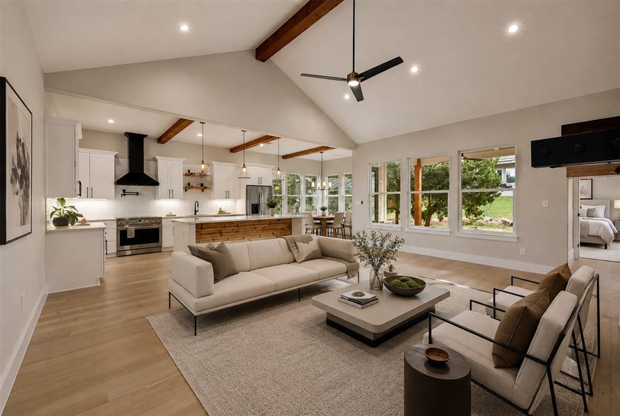 Virtual Staging. Vaulted ceilings with exposed beams crown an airy, open living area with rich hardwood flooring. Virtual Staging. Vaulted ceilings with exposed beams crown an airy, open living area with rich hardwood flooring.