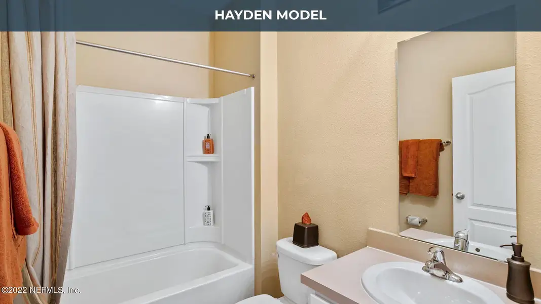 Furnished interior view inside a new home in Cross Creek Express, Green Cove Springs (Image 14).