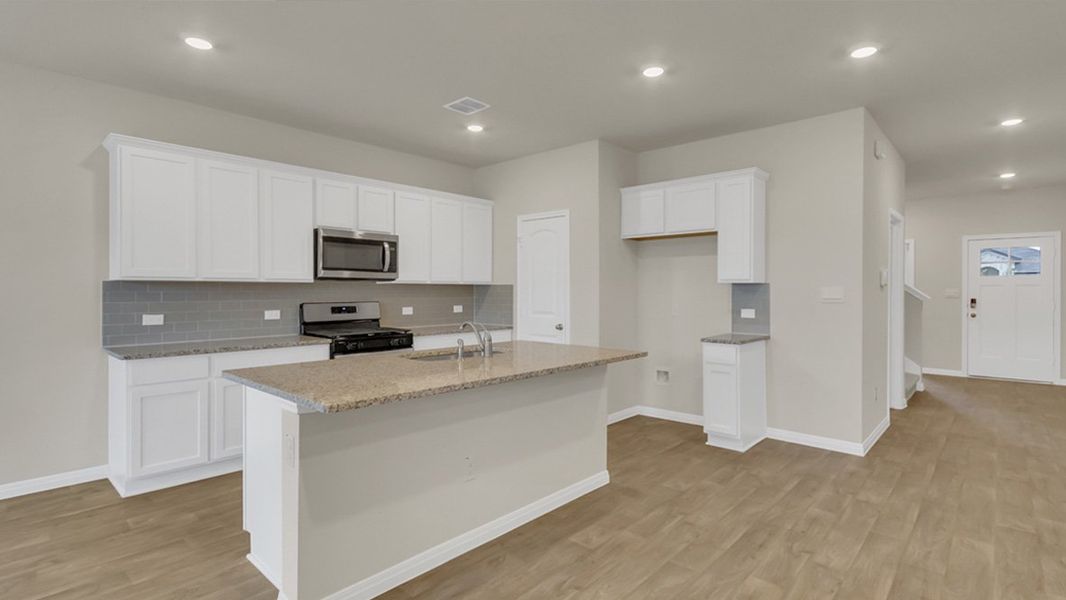 Furnished interior view inside a new home in Rosenbusch Ranch, Leander (Image 5). Furnished interior view inside a new home in Rosenbusch Ranch, Leander (Image 5).