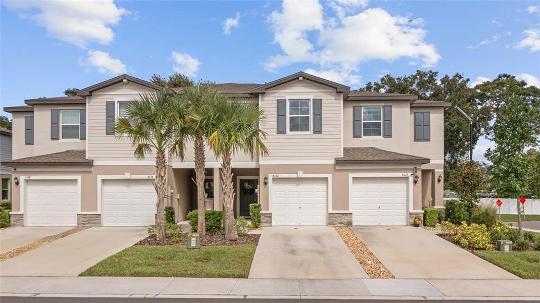 Front exterior of a new home in , Land O' Lakes, FL, highlighting curb appeal (Image 27). Front exterior of a new home in , Land O' Lakes, FL, highlighting curb appeal (Image 27).