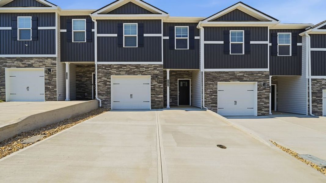 Front exterior of a new home in The Arbor Townhomes, Kingsport, TN, highlighting curb appeal (Image 2).