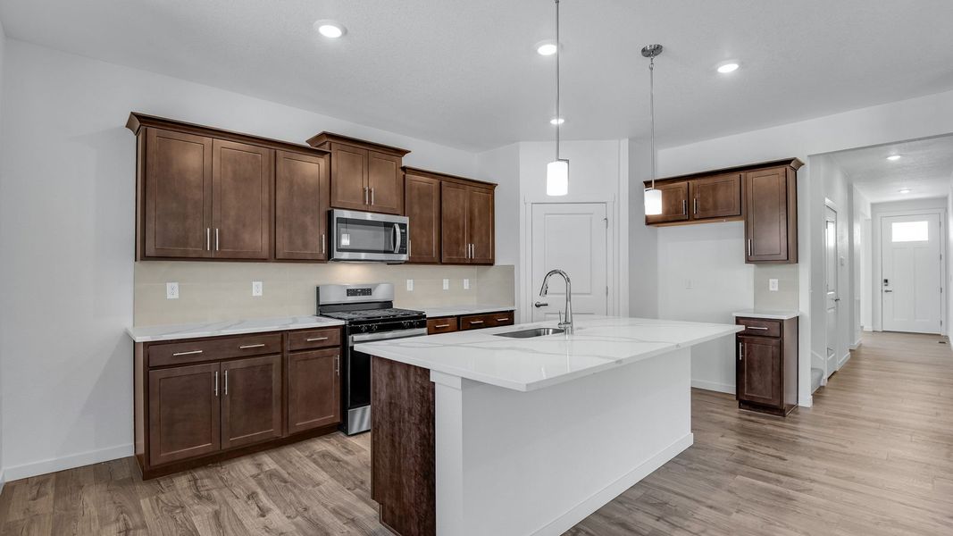 Furnished interior view inside a new home in Trails at Crowfoot, Parker (Image 7).
