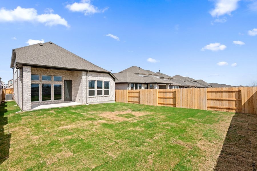 Exterior details and patio area of a home in Flora, Hutto (Image 26).