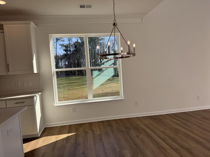 Spacious, unfurnished interior of a new home in East Main Townes, Spartanburg (Image 11).