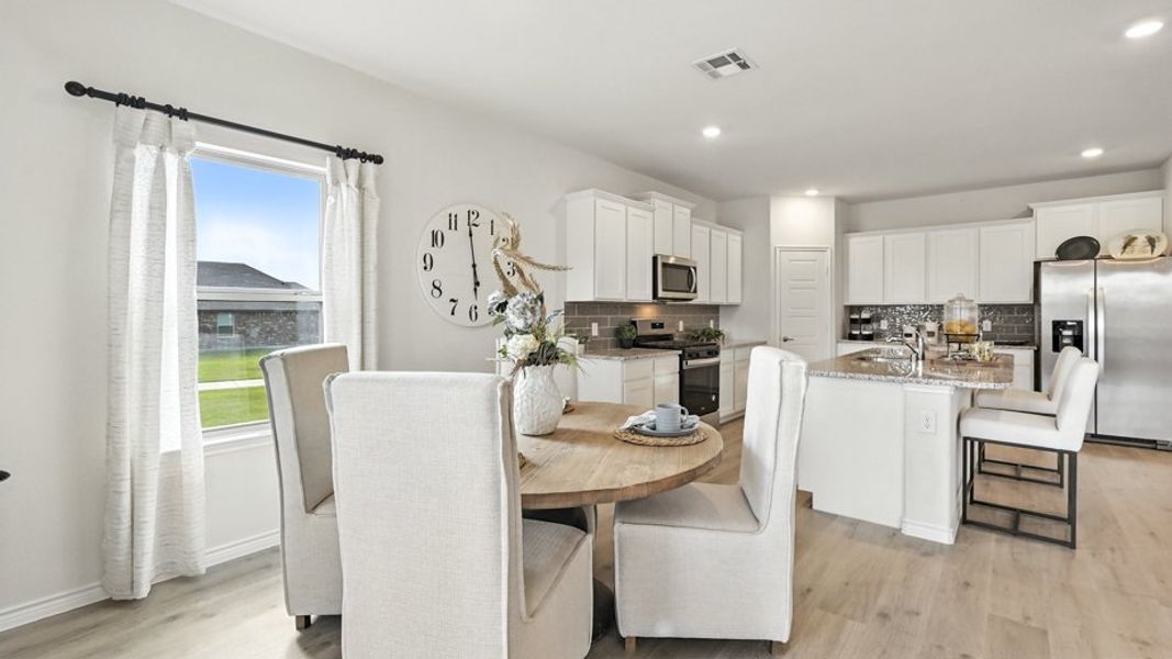Representative furnished interior of a home built from the Ivery II by D.R. Horton in Elevon, Lavon (Image 4).