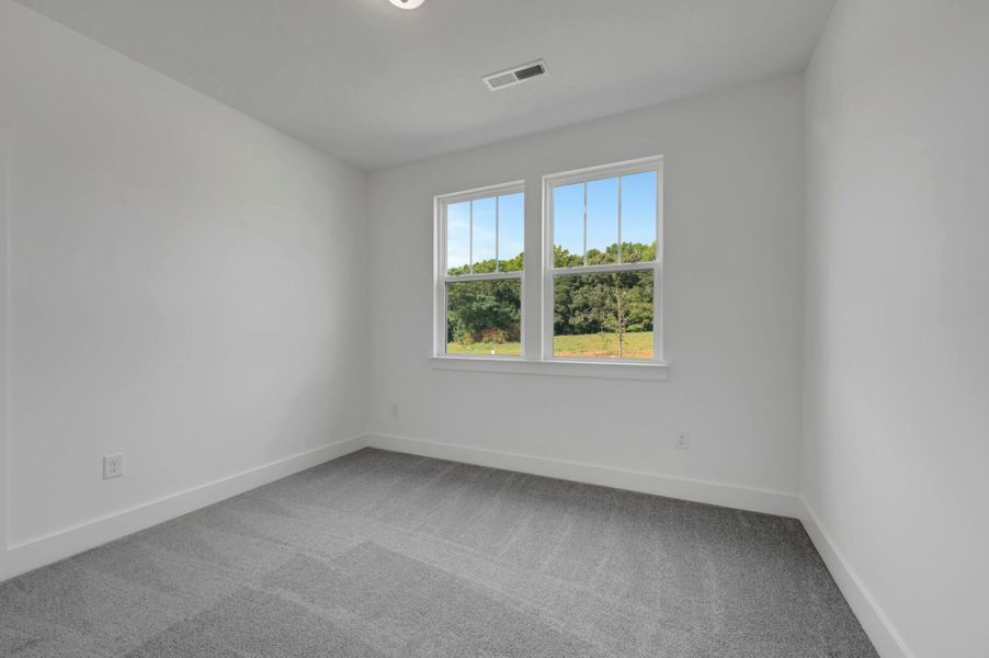 Spacious, unfurnished interior of a new home in McAlister Creek, Clayton (Image 25).