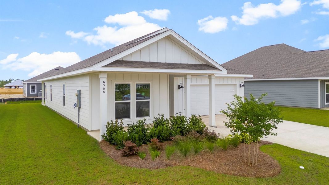 Front exterior of a new home in Liberty, Panama City, FL, highlighting curb appeal (Image 2). Front exterior of a new home in Liberty, Panama City, FL, highlighting curb appeal (Image 2).