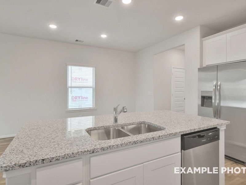 Furnished interior view inside a new home in Caney Creek Place, Conroe (Image 7).