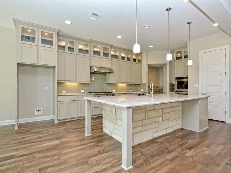 Representative furnished interior of a home built from the Santa Barbara II by Giddens Homes in Scofield Farms Estates, Georgetown (Image 6).