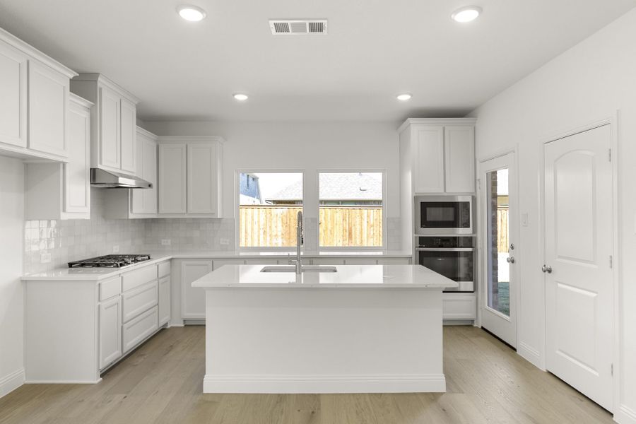Furnished interior view inside a new home in The Reserve at Spiritas Ranch, Little Elm (Image 4).