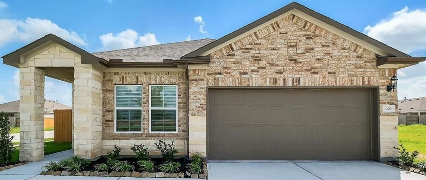 Front exterior of a new home in Emberly, Beasley, TX, highlighting curb appeal (Image 39).