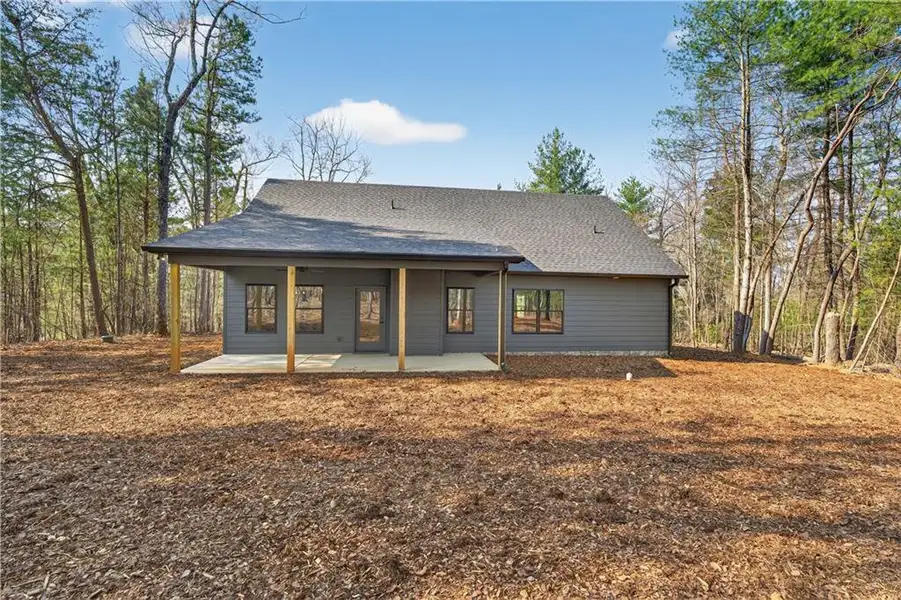 Exterior details and patio area of a home in , Ellijay (Image 3).
